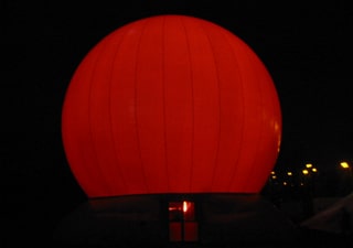 Lighted inflatable globe with light effects